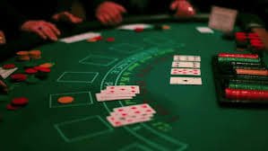 Filipino player browsing bingoolus slots and live casino on mobile phone